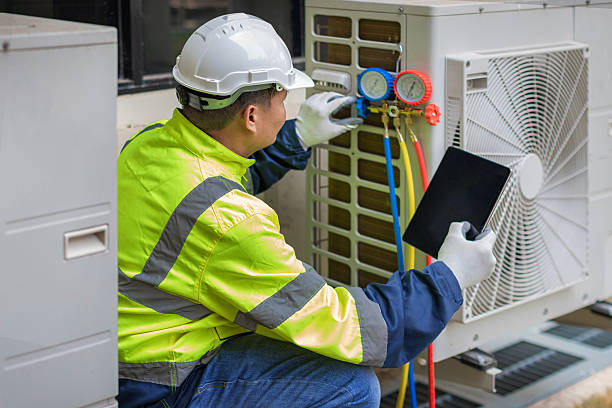 Professional Hvac technician working in Newalla, OK
